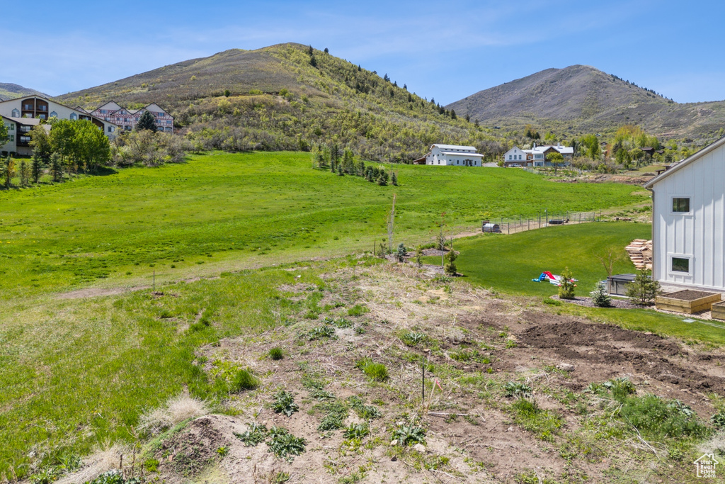 View of yard featuring a mountain view and a rural view