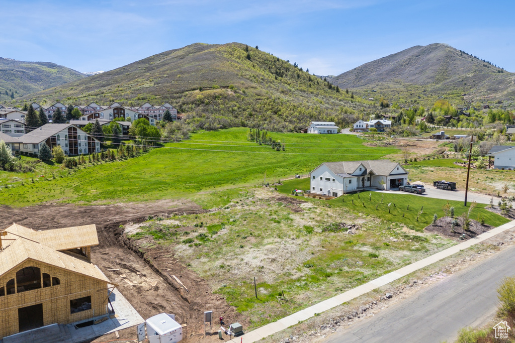 View of mountain background featuring nearby suburban area