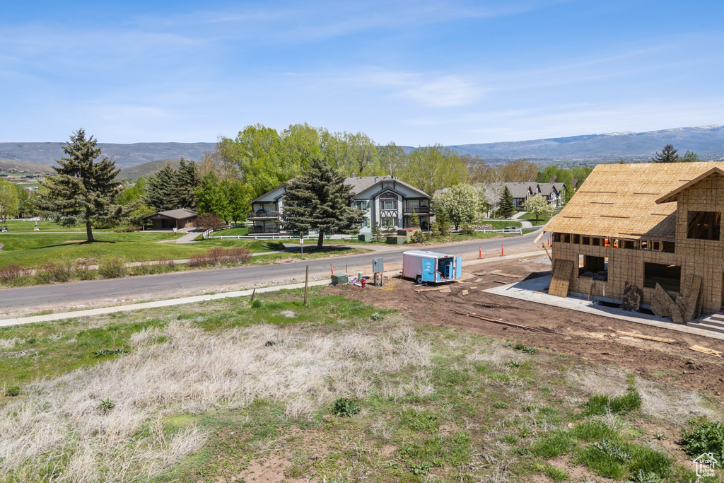 View of yard with a mountain view