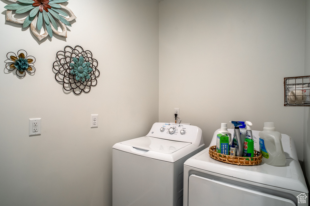 Washroom featuring separate washer and dryer
