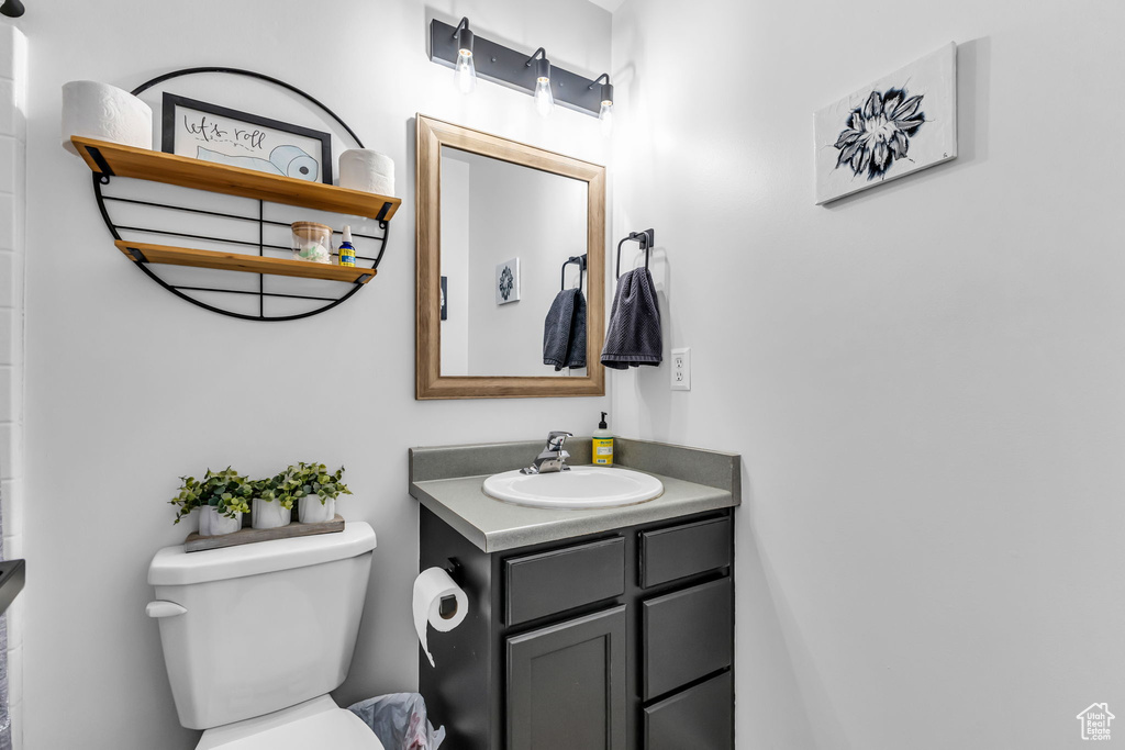 Bathroom with toilet and vanity