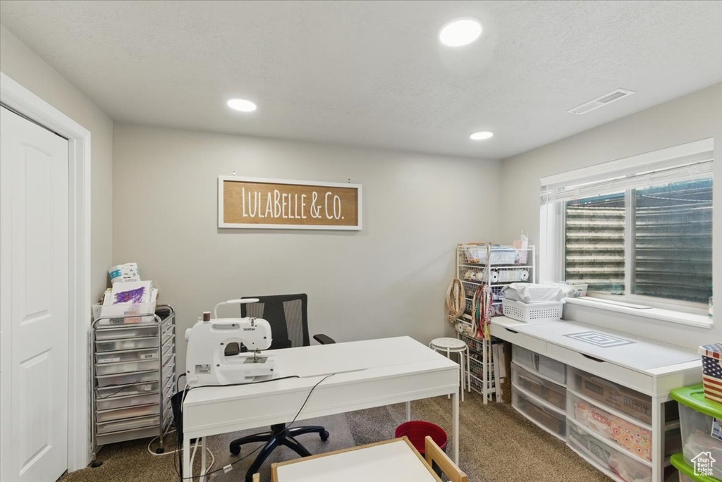 Office area featuring carpet flooring and recessed lighting