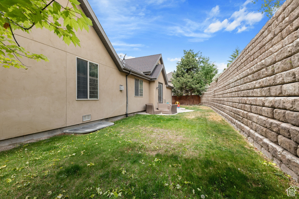 View of yard featuring outdoor lounge area and a patio area