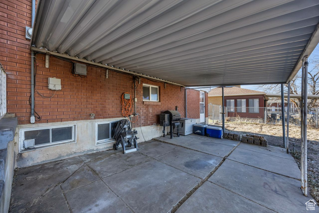 View of patio / terrace with fence and area for grilling