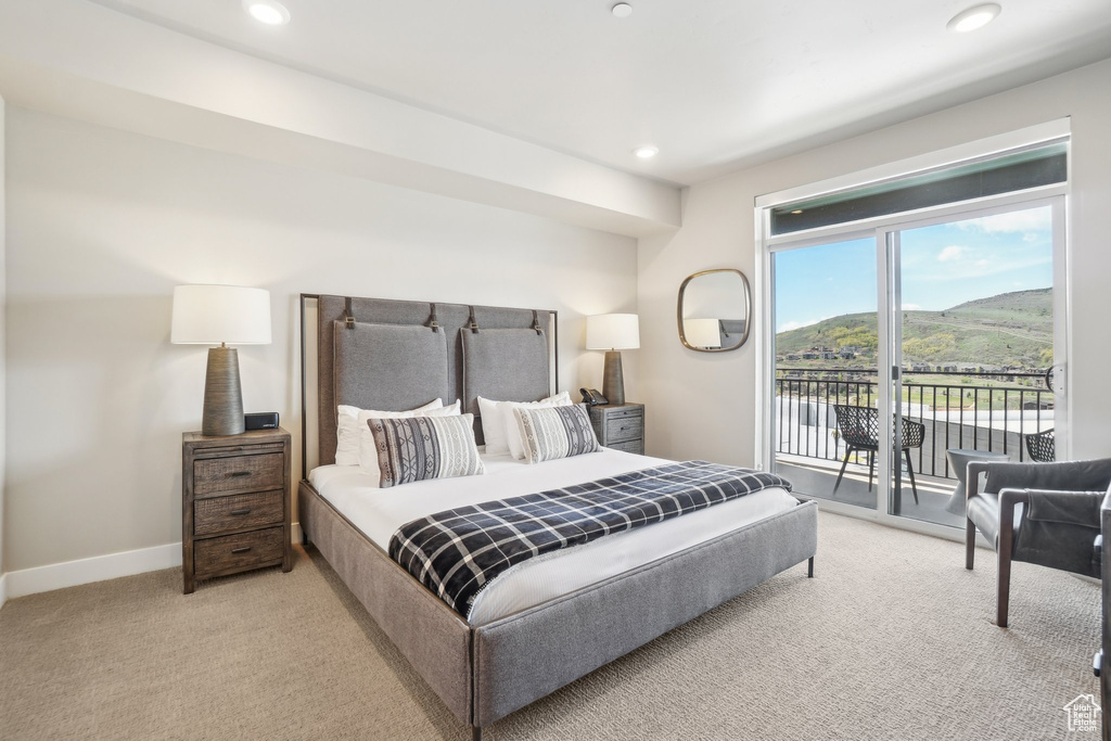 Bedroom with carpet floors, access to outside, recessed lighting, and baseboards