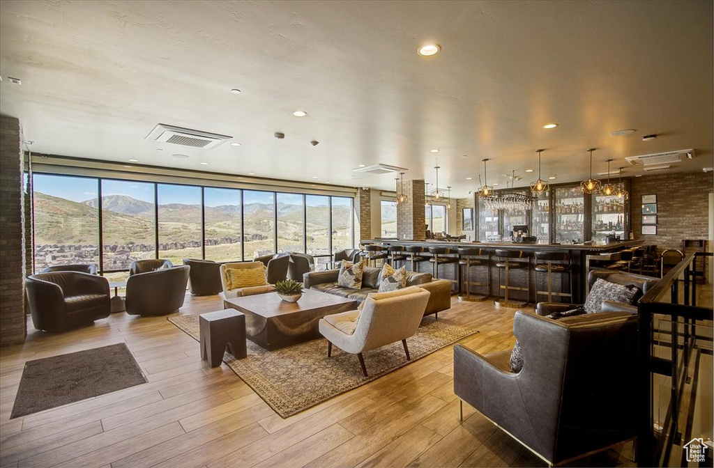 Lobby featuring a mountain view and floor to ceiling windows