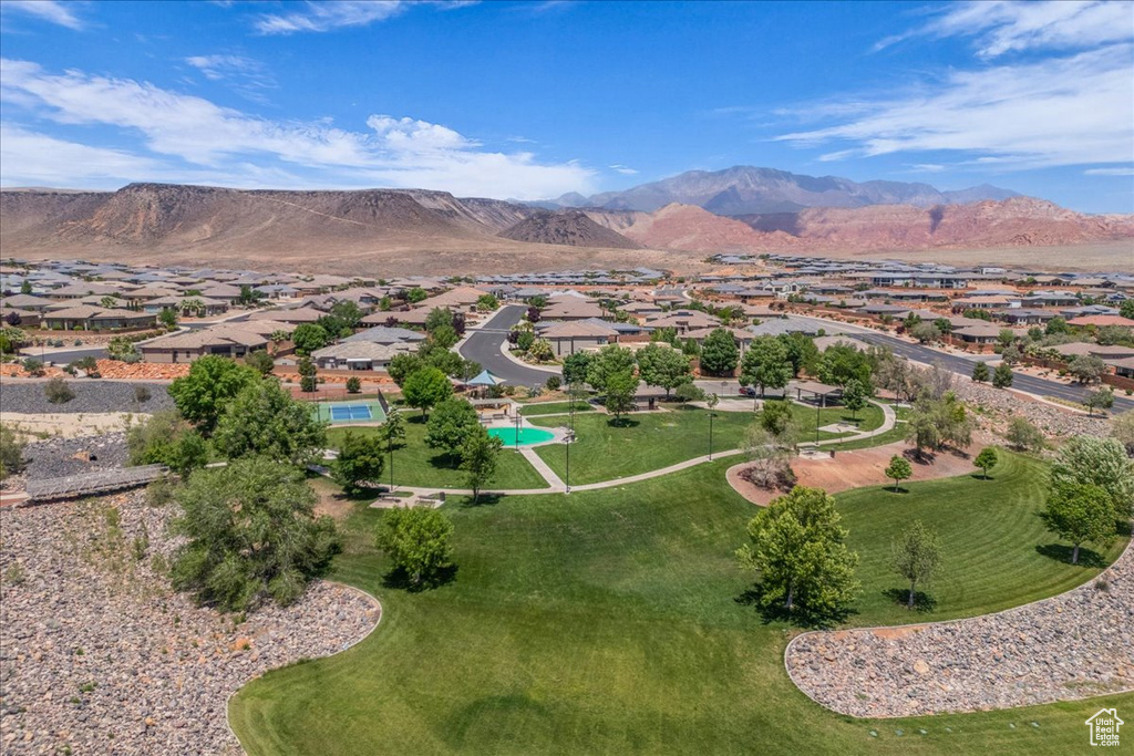 Aerial view of residential area with a mountain backdrop