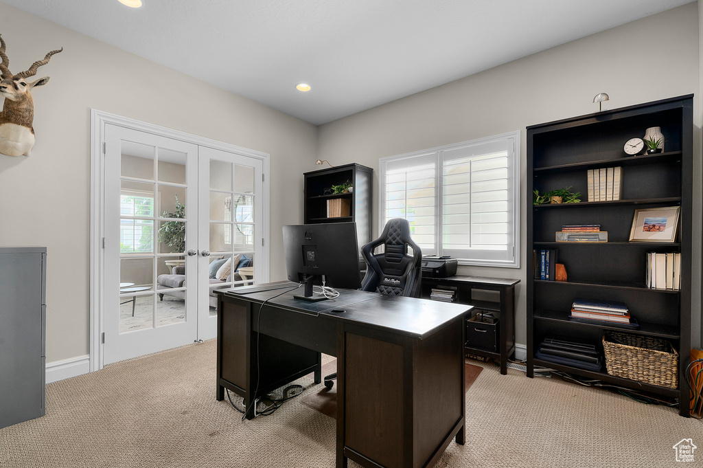 Home office featuring carpet flooring, french doors, and recessed lighting