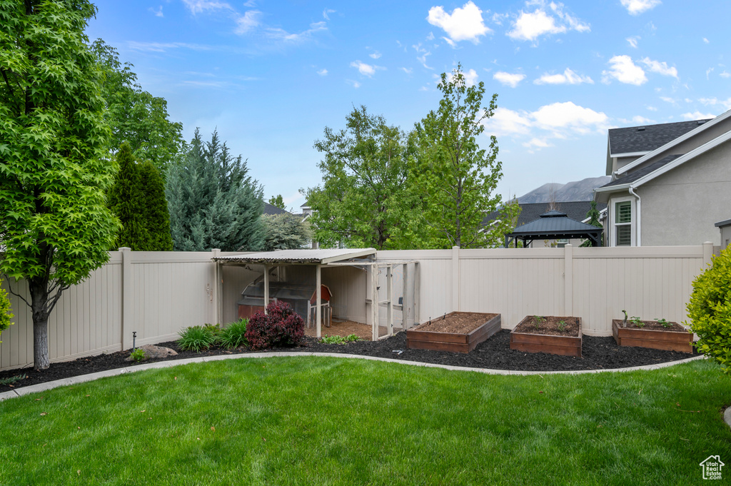 View of yard featuring a vegetable garden