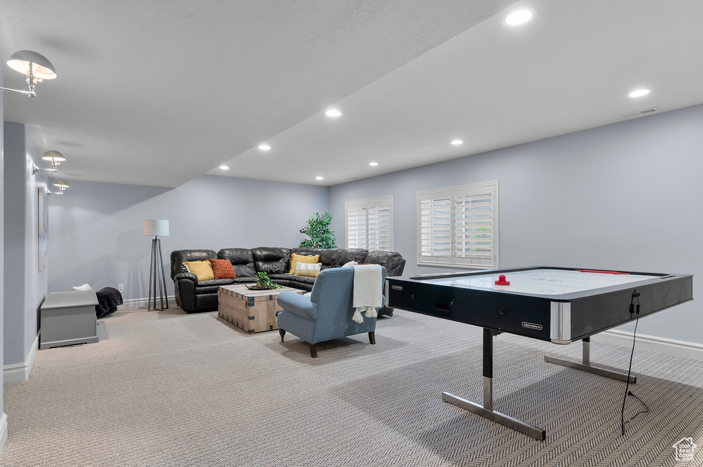 Game room with carpet flooring, recessed lighting, and baseboards