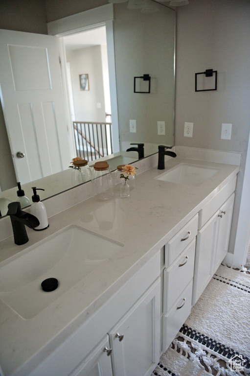 Full bathroom with double vanity