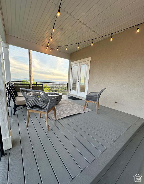 Deck at dusk with french doors