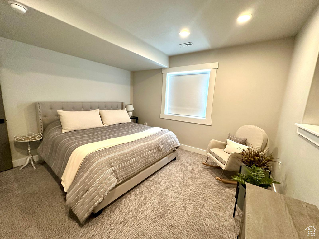 Bedroom with carpet, baseboards, and recessed lighting