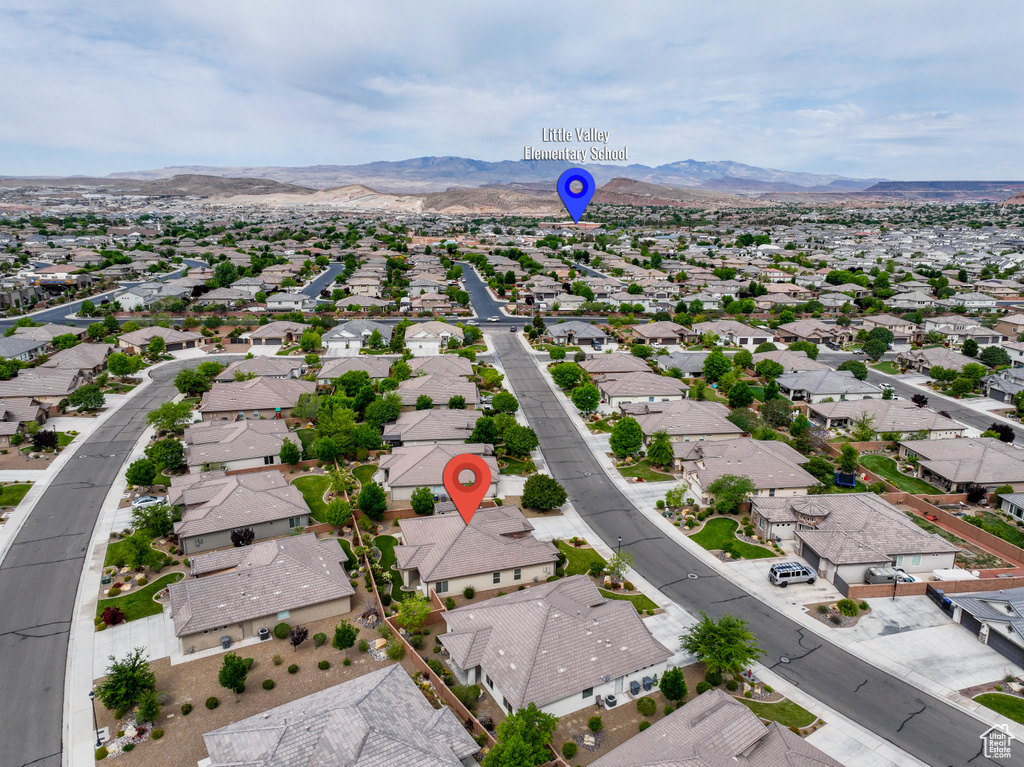Aerial view of residential area with mountains