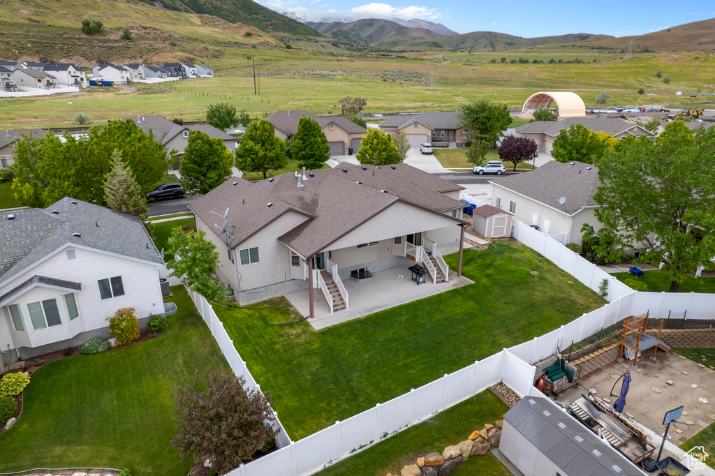Aerial view of residential area with mountains