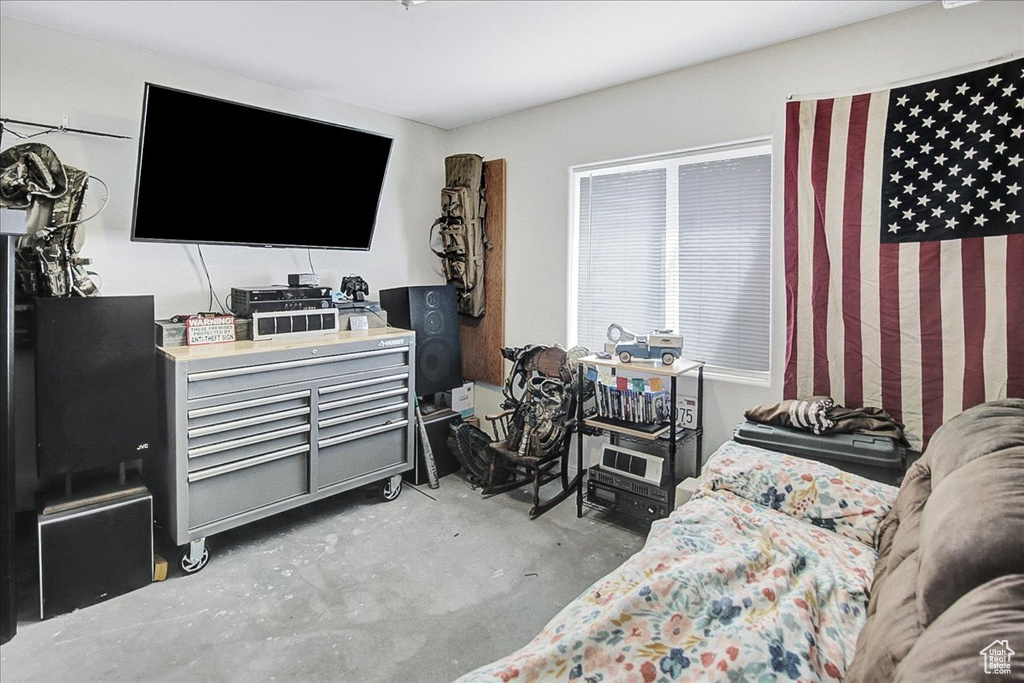 Living room with unfinished concrete floors