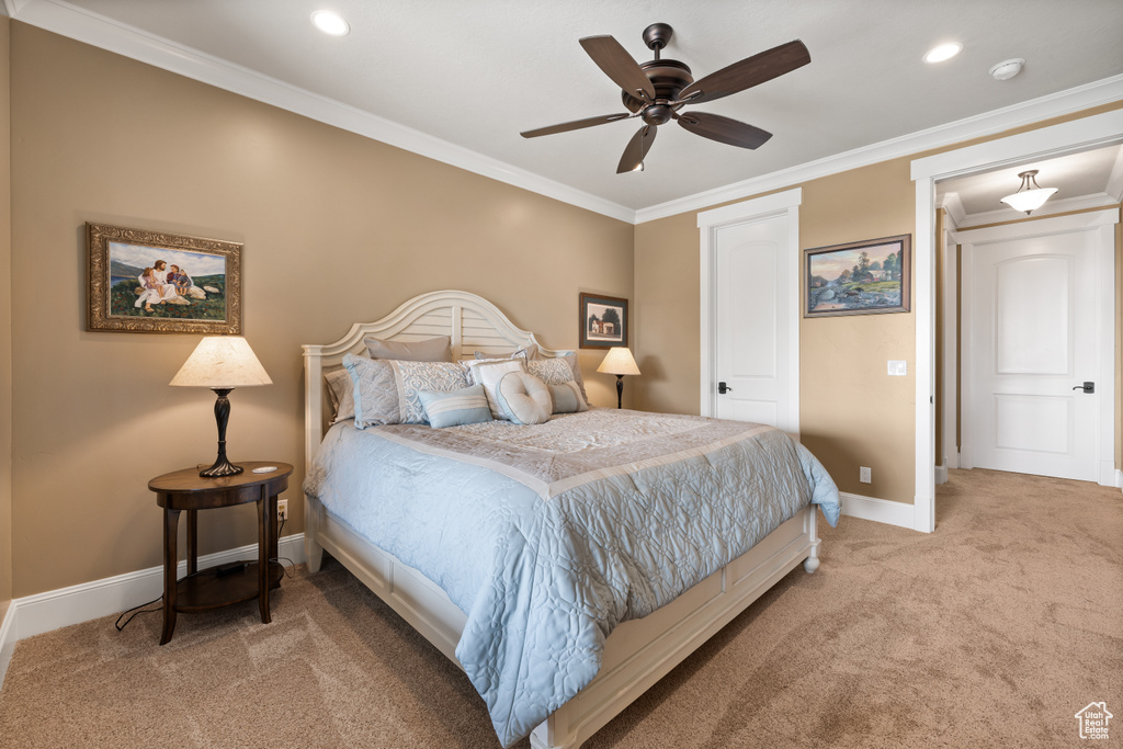 Bedroom with carpet floors, baseboards, ornamental molding, recessed lighting, and ceiling fan