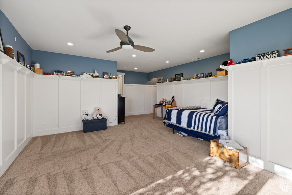 Bedroom with carpet flooring, recessed lighting, and ceiling fan