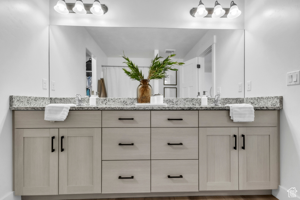 Bathroom featuring double vanity