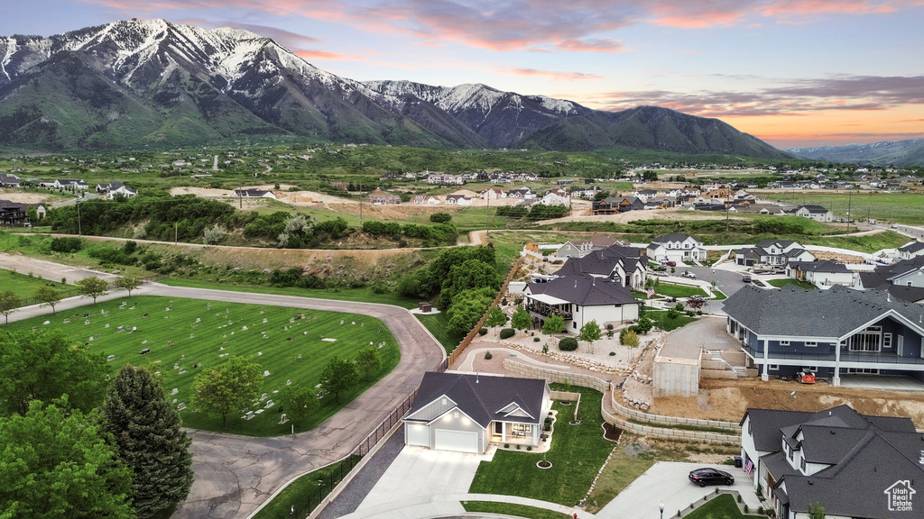 Aerial view at dusk of a residential view and a mountain view
