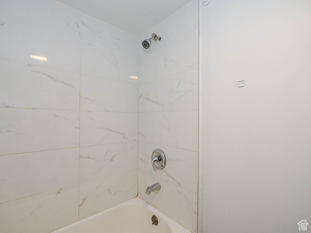 Bathroom with bathtub / shower combination