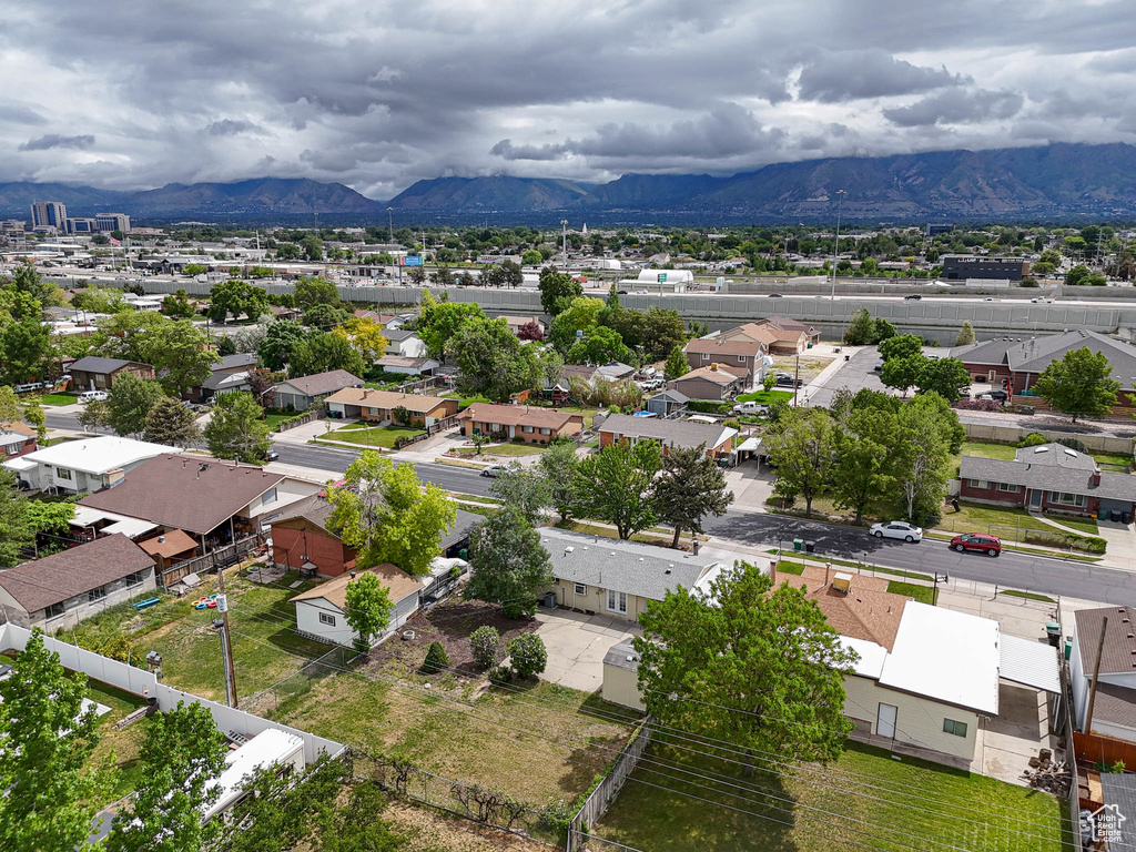 Aerial view of residential area featuring mountains
