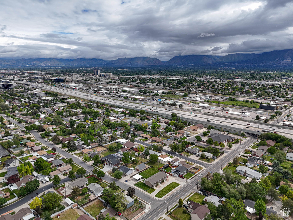 Aerial view of property's location with a mountain backdrop