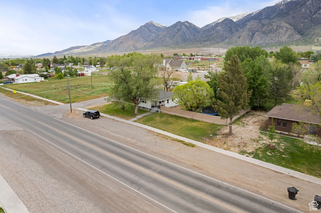 Mountain view featuring nearby suburban area