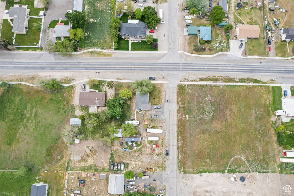Aerial view of property's location featuring nearby suburban area