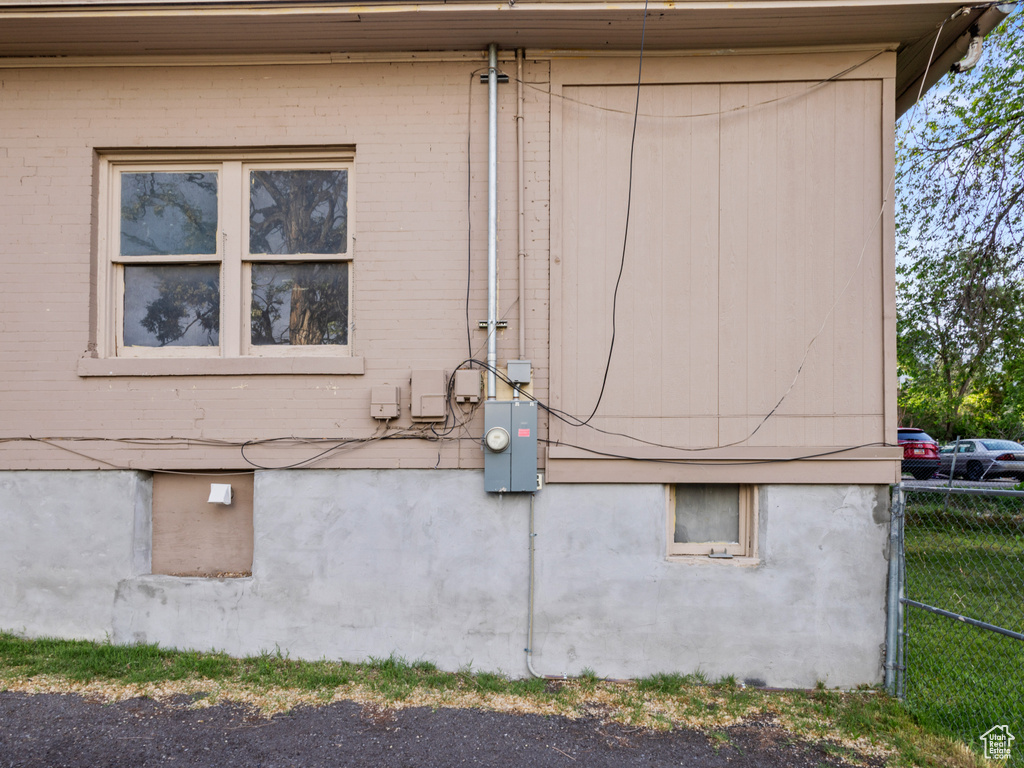 View of side of property with fence