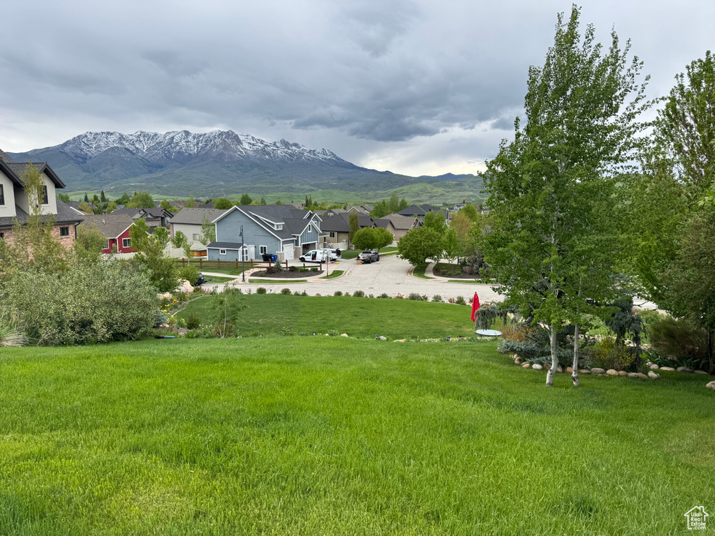 View of mountain background featuring nearby suburban area