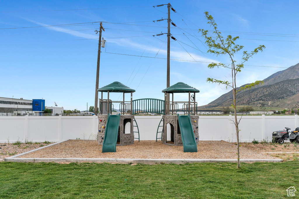 Community playground with a mountain view