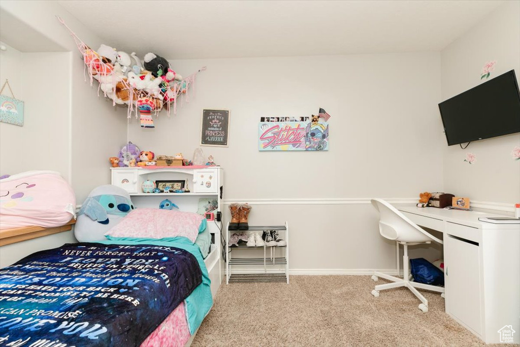 Bedroom with carpet and baseboards