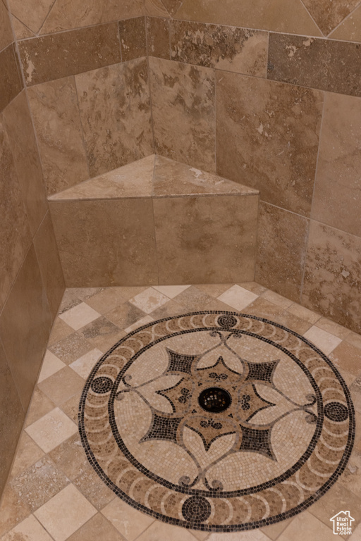 Bathroom view of a tile shower