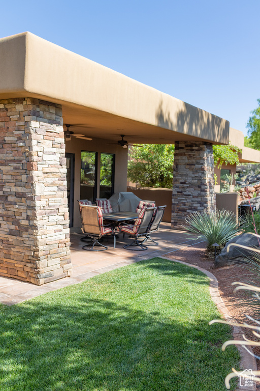 View of patio / terrace featuring a ceiling fan
