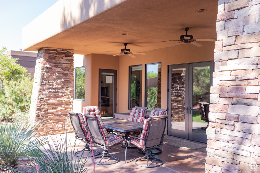 View of patio / terrace with french doors and ceiling fan