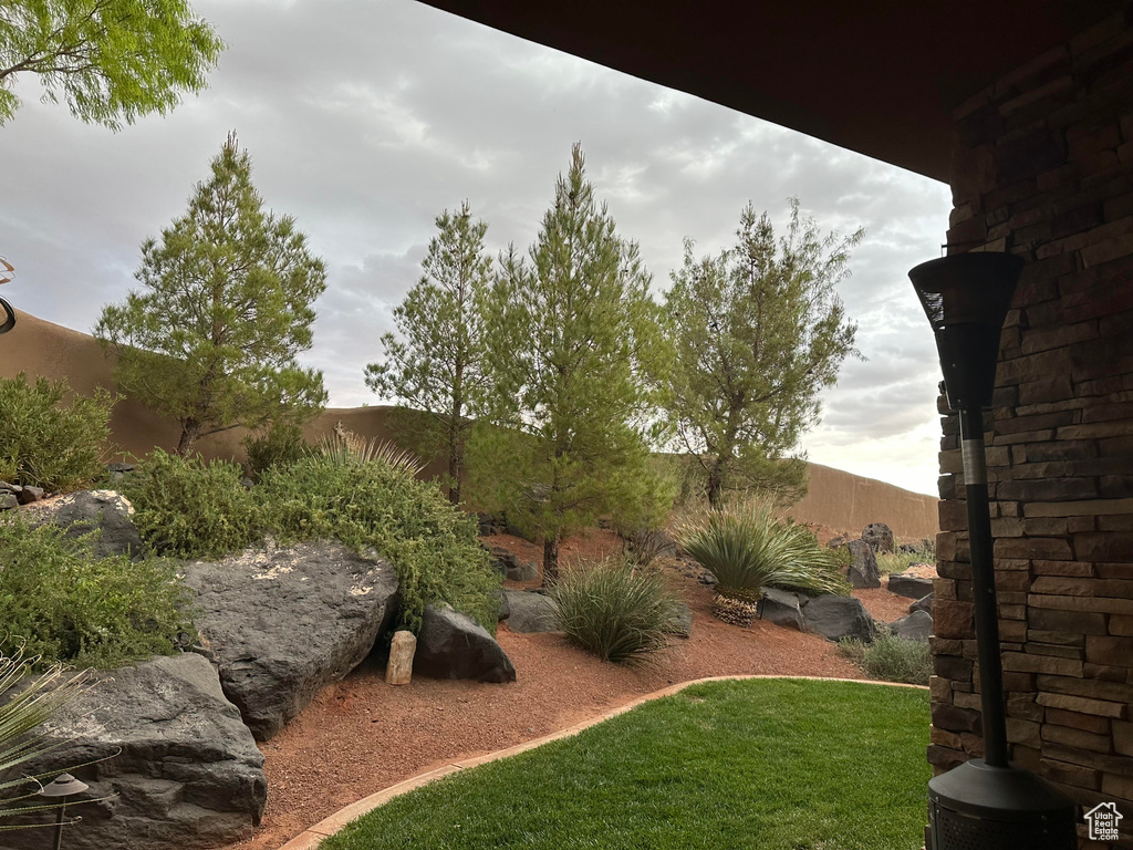 View of yard featuring fence