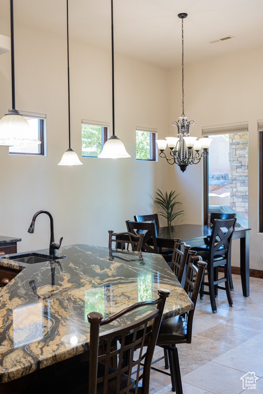 Dining room with a chandelier