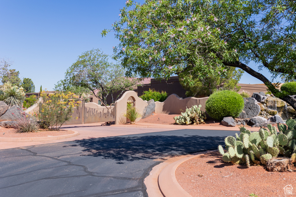 View of yard featuring a gate and fence
