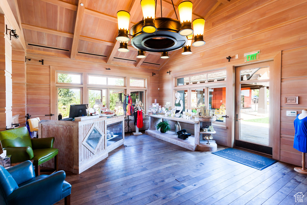 Reception featuring wood walls and wood ceiling