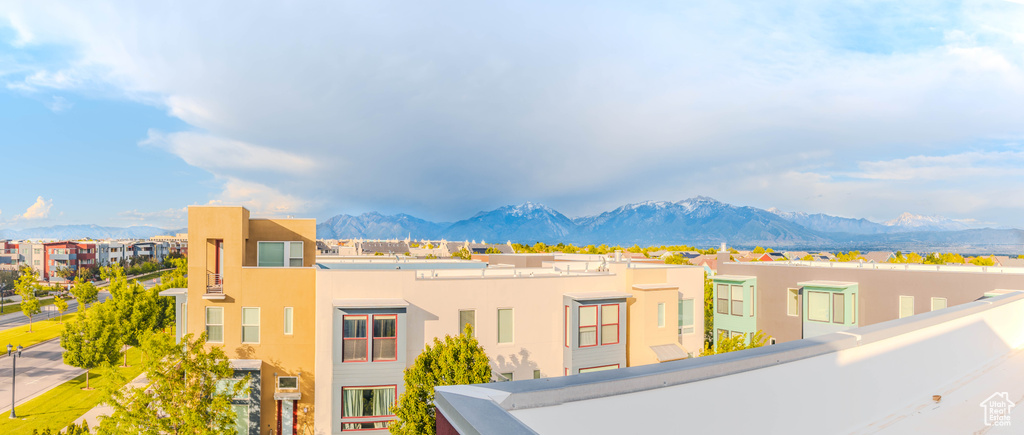 View of mountain background featuring nearby suburban area