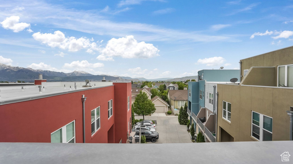 View of property with a mountain view