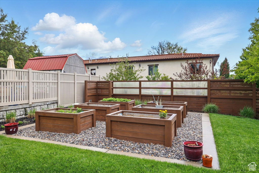 View of yard with a vegetable garden