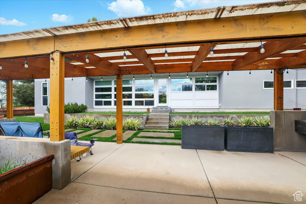 View of patio featuring a pergola