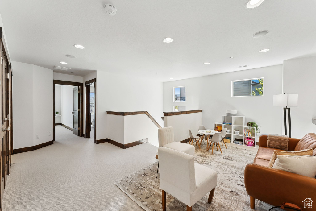 Living room featuring recessed lighting and baseboards