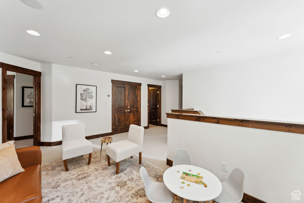 Living area featuring recessed lighting and baseboards