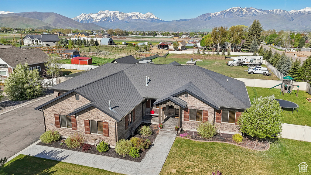 View of subject property featuring mountains