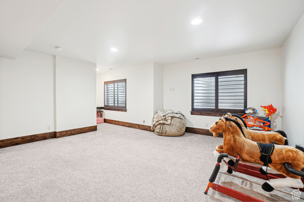 Playroom featuring baseboards, carpet flooring, and recessed lighting