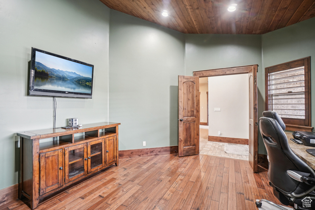 Office area with light wood-style flooring, wood ceiling, baseboards, and recessed lighting