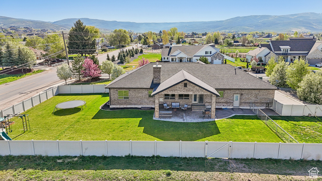 View of subject property with a mountainous background